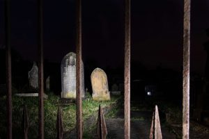 Gravestones at night