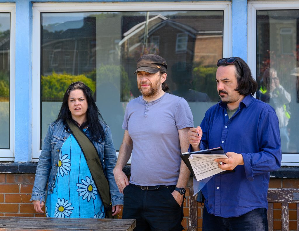 director assistant director and director in conversation
