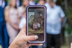 me shooting you, shooting them. Capturing unscripted moments of guests capturin the wedding day on a mobile phone. phone screen screen showing wedding guest. candid wedding photography, South Wales, by Charlie Hannah