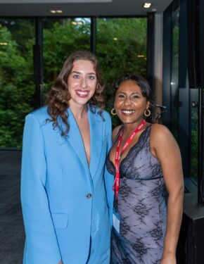 Two women posing as backstage hosts wearing lanyards at an event in Cardiff, photographed by South Wales event photographer Charlie Hannah