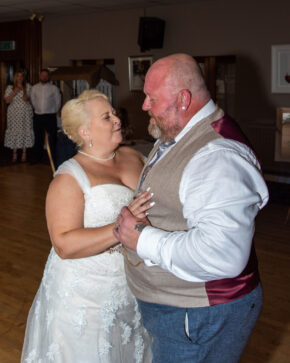 The bride and groom sharing their first dance together at the Tracy and Jim evening reception, photographed by South Wales wedding photographer Charlie Hannah